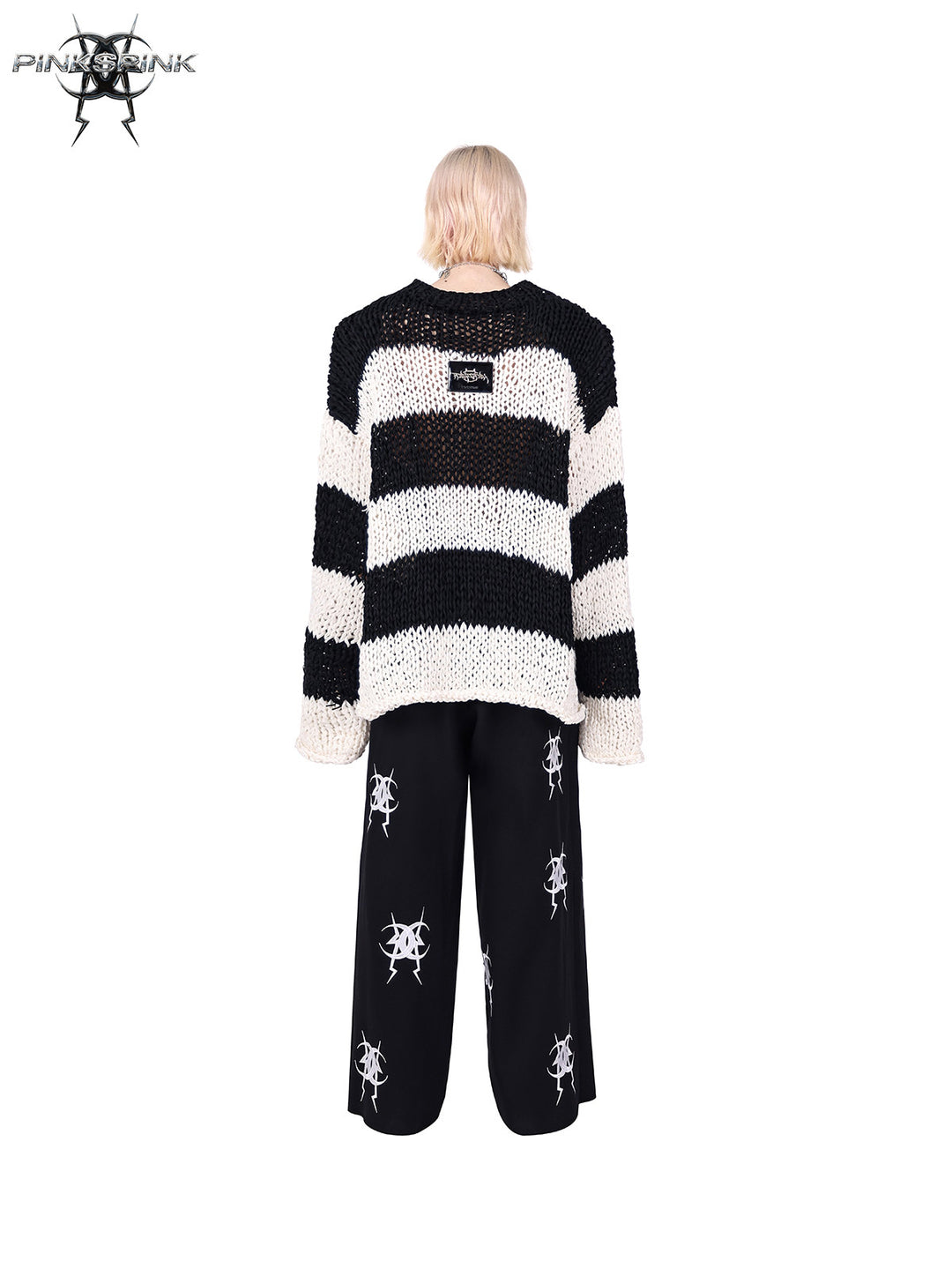 PINKSPINK MIRROR striped open-knit padded-shoulder sweater in black white stripes — rear full-length modeled view without the matching balaclava