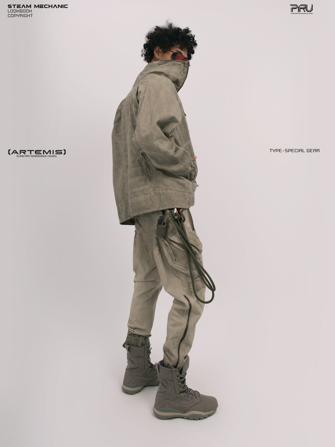 ARTEMIS tuck-paneled technical jacket — side modeled view with raised collar