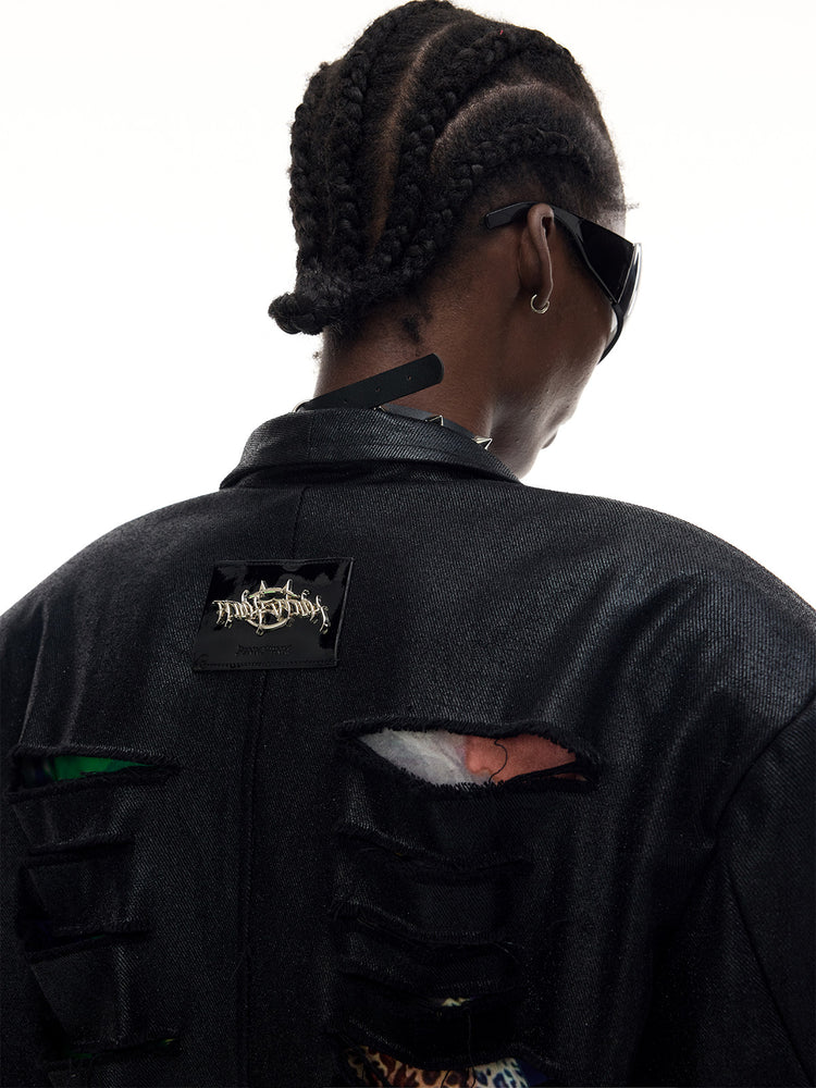 PINKSPINK BREACH distressed coated oversized blazer in black — close-up of the upper back label, coating texture and torn openings
