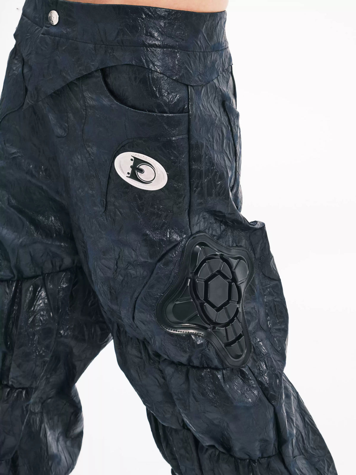 EMBRYO GUARD SHELL ruched PU leather flare pants — pocket and guard-panel detail