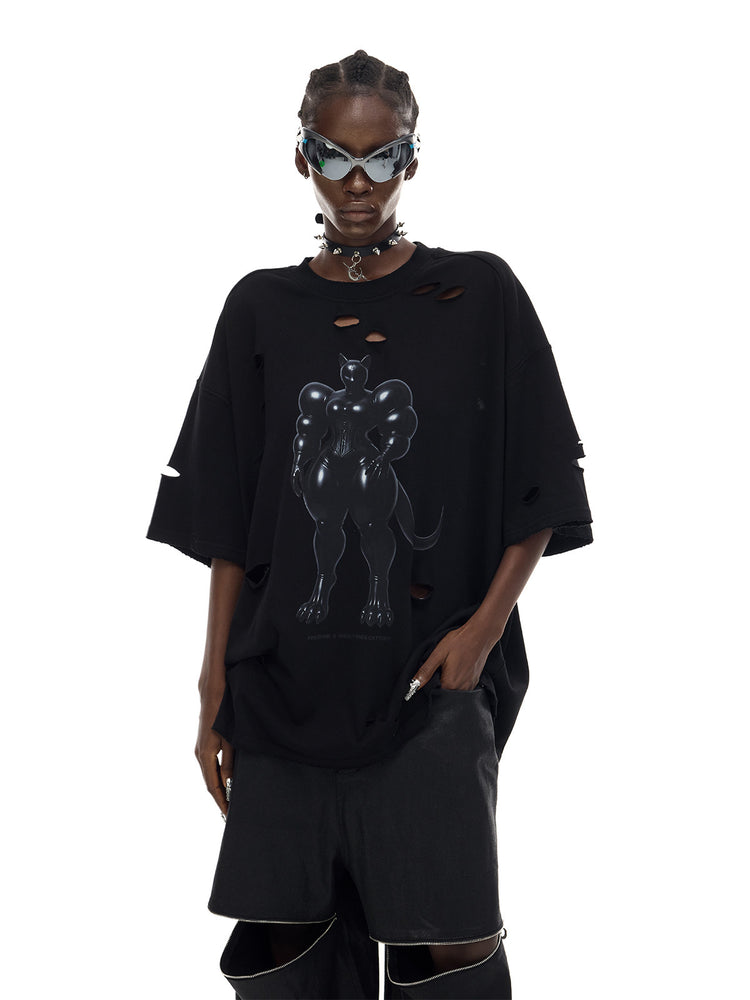 PINKSPINK FUTURE CAT distressed oversized tee in black — three-quarter front modeled close-up with a loose waist