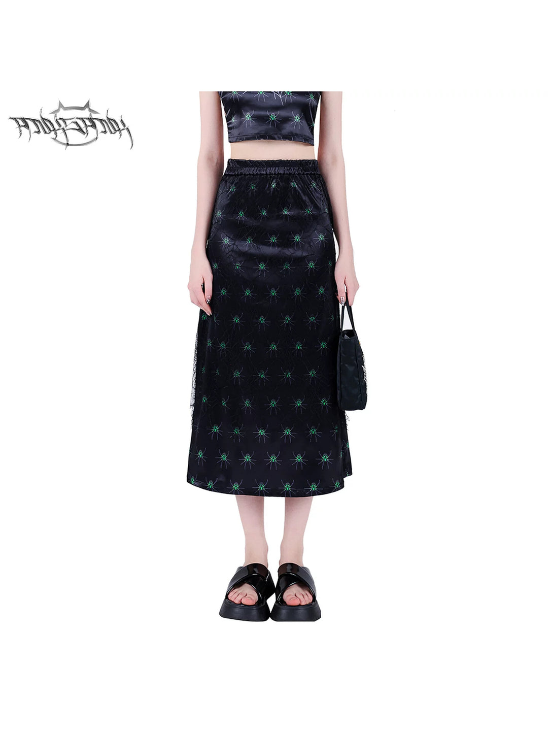 PINKSPINK SPIDER layered web-mesh midi skirt — front waist-to-hem modeled view showing the layered spider skirt
