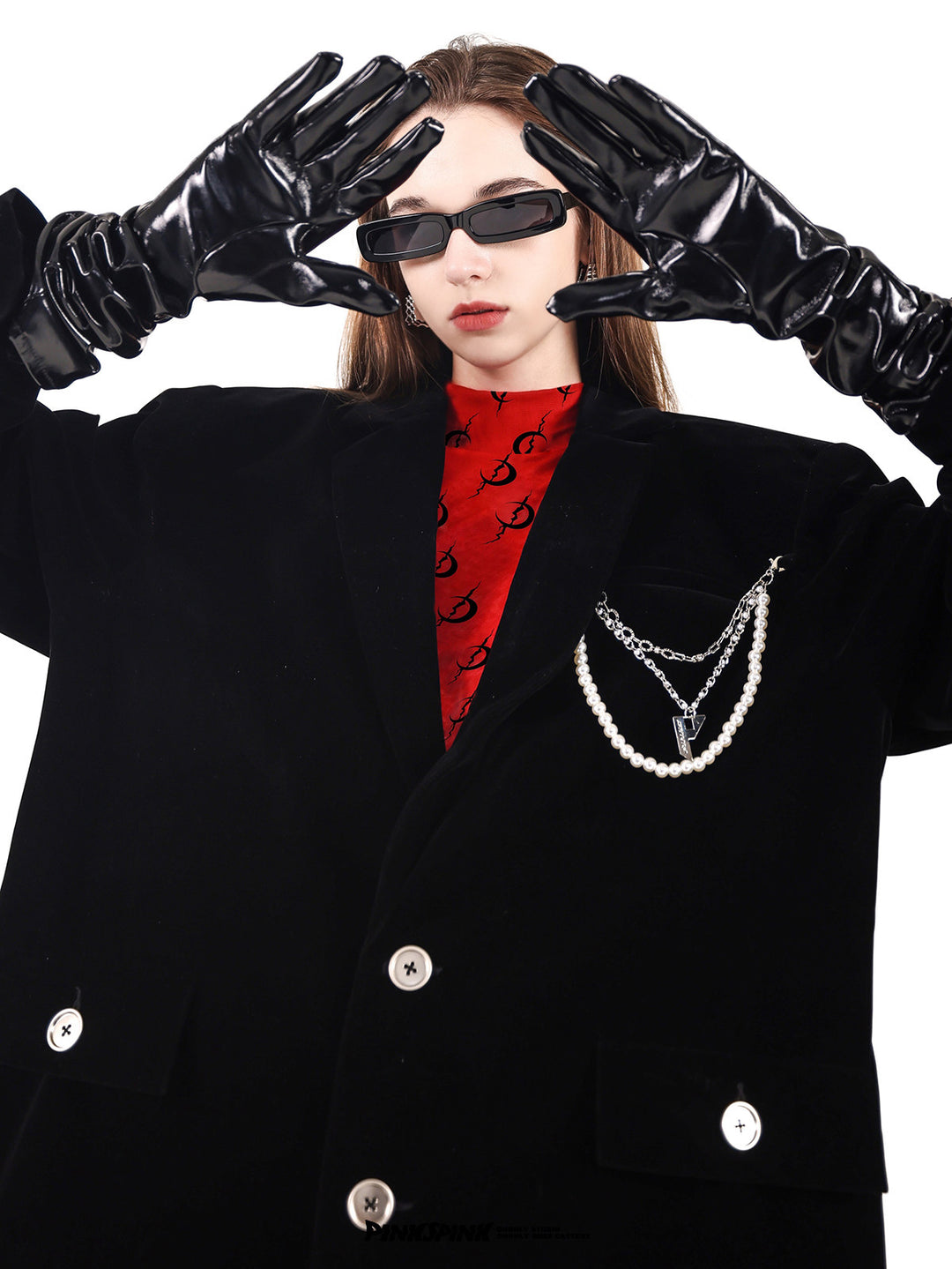 PINKSPINK DEAN pearl-chain velvet blazer — black raised-arm close-up showing the structured shoulders