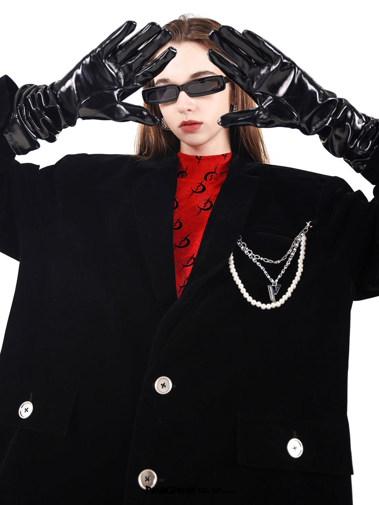 PINKSPINK DEAN pearl-chain velvet blazer — black raised-arm close-up showing the structured shoulders