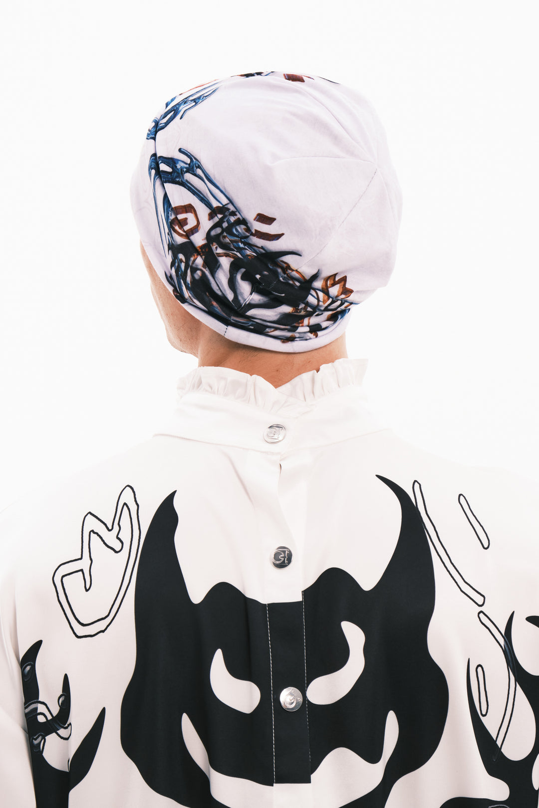 EMBRYO TRIBAL ENTITY graphic slouch beanie — rear modeled view