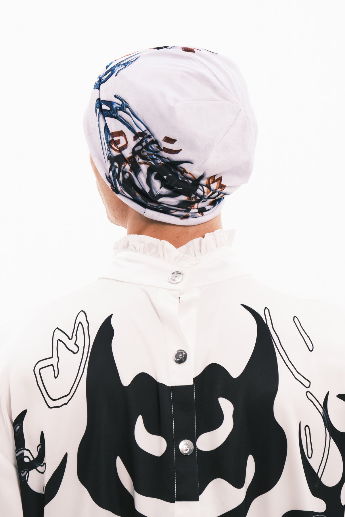 EMBRYO TRIBAL ENTITY graphic slouch beanie — rear modeled view