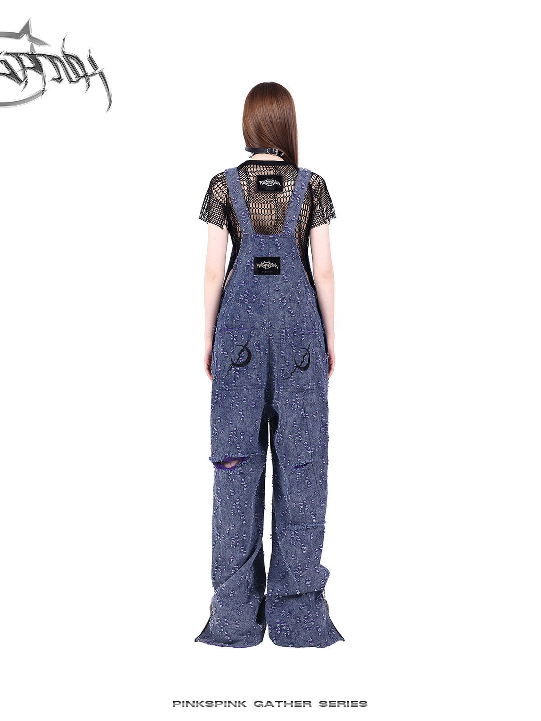 PINKSPINK GEOMETRY open-mesh crop tee in black — rear styling view with purple denim overalls