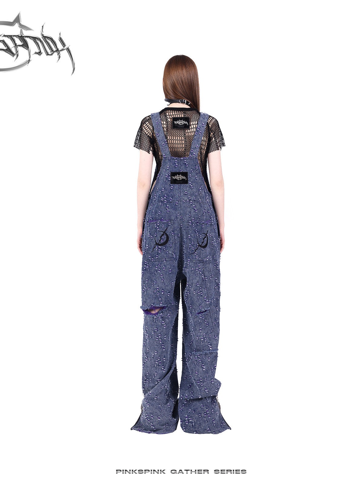 PINKSPINK GEOMETRY open-mesh crop tee in black — rear styling view with purple denim overalls