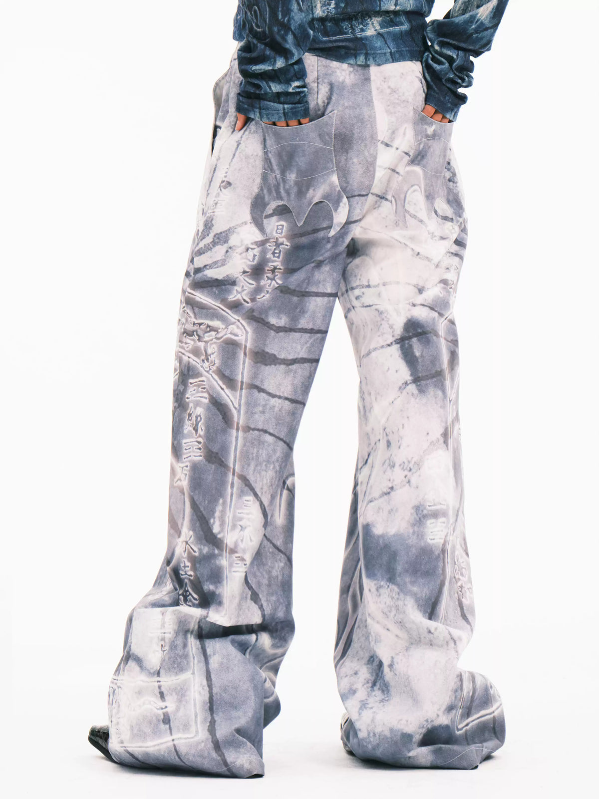 EMBRYO ANCIENT CODE coated wide-leg pants — alternate modeled angle