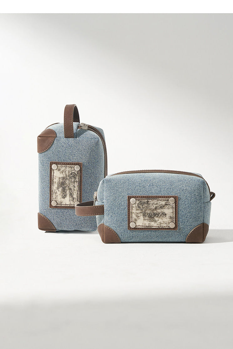 NAWS BLUE BOX denim makeup bag — close-up view of the material and finishing