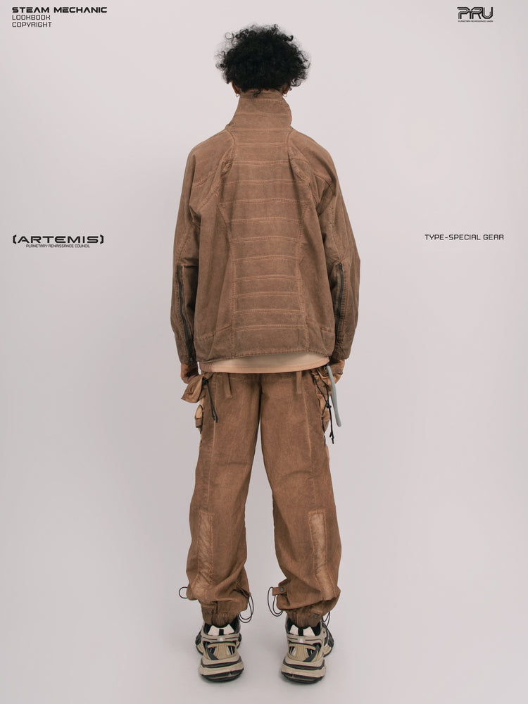 ARTEMIS soft dawn orange tuck-paneled technical jacket — full-length back modeled view