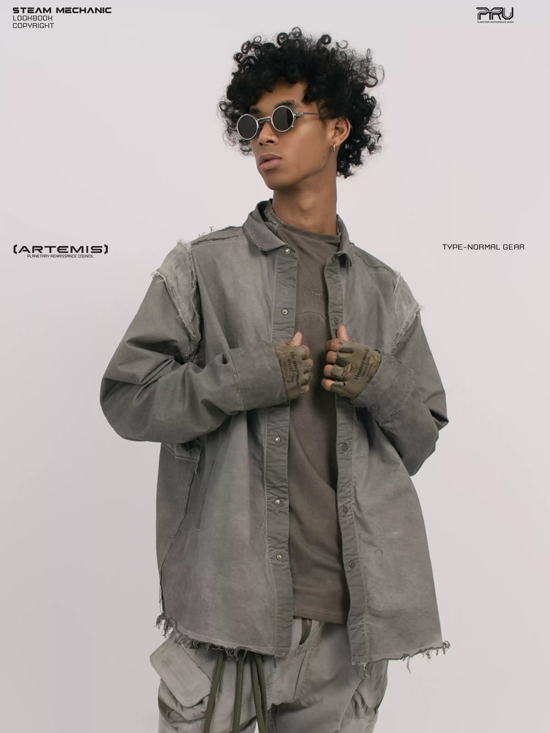 CHAOS ERA moon dust gray raw-edge technical shirt — front three-quarter modeled view with clasped hands