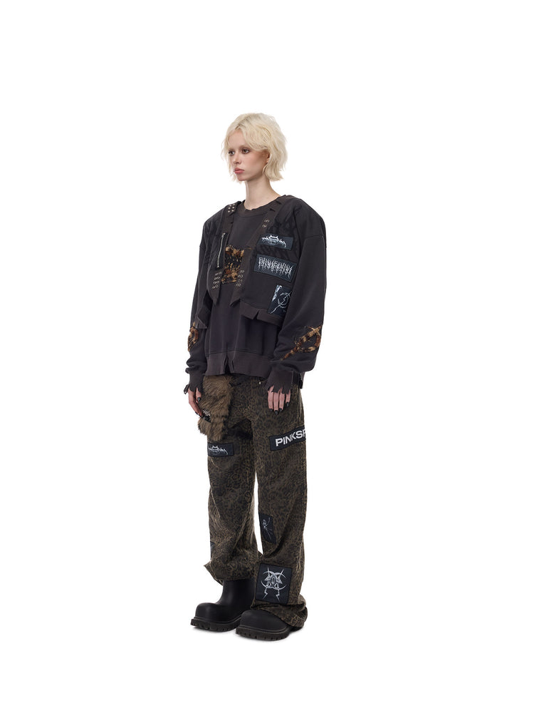 PINKSPINK LEOPARD RIOT detachable-pouch wide-leg pants — three-quarter full-length view with layered sweatshirt