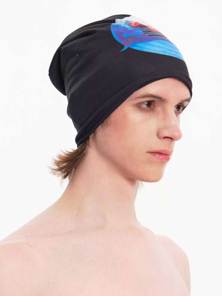 EMBRYO PLAN black graphic slouch beanie — front modeled view