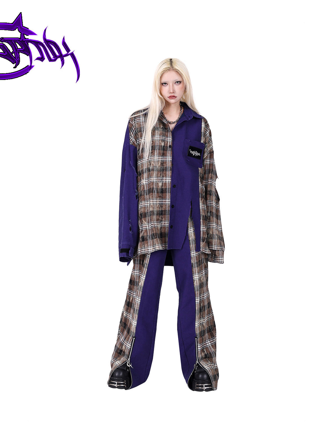 PINKSPINK DNA purple plaid split-panel wide-leg pants — front full-length modeled view with the plaid shirt buttoned