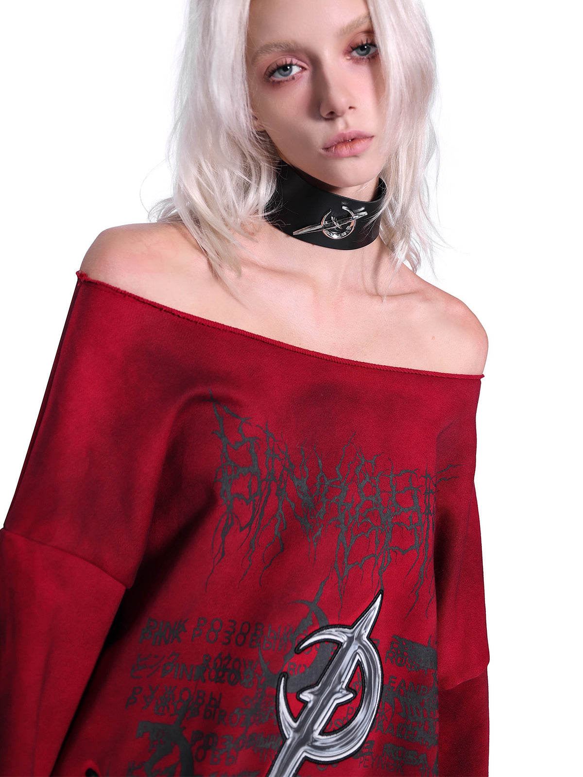 PINKSPINK ELECTRIC MOON off-shoulder sweatshirt in RED — close neckline and distressed-print detail.