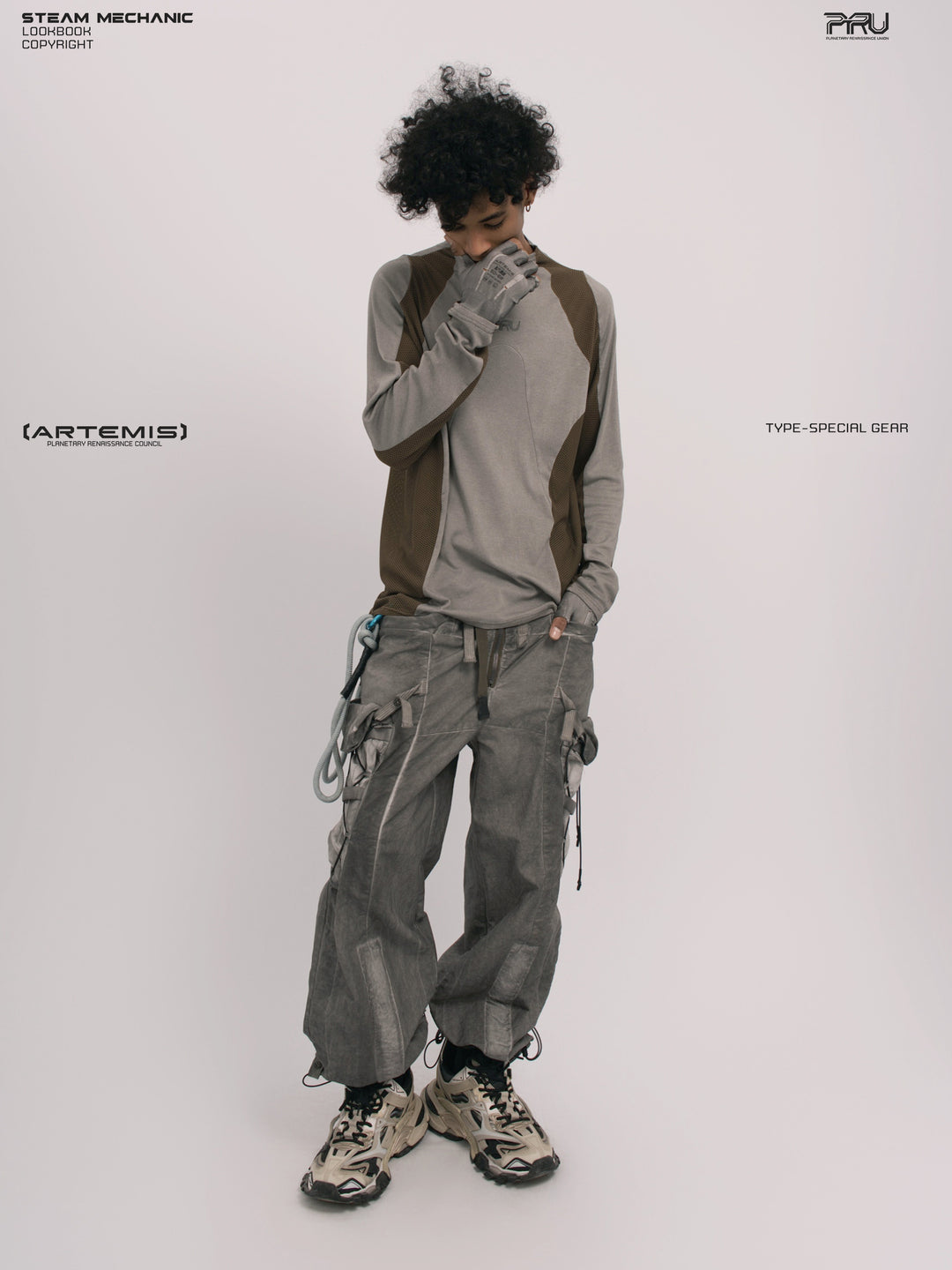 STARCORE ash tundra mesh-panel long-sleeve top b — full-length front modeled view with collar raised