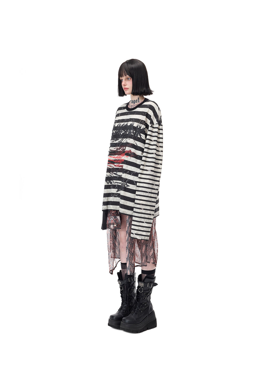 PINKSPINK STATIC asymmetric striped burnout long-sleeve tee in black and white — full-length side modeled view with a separate patterned skirt