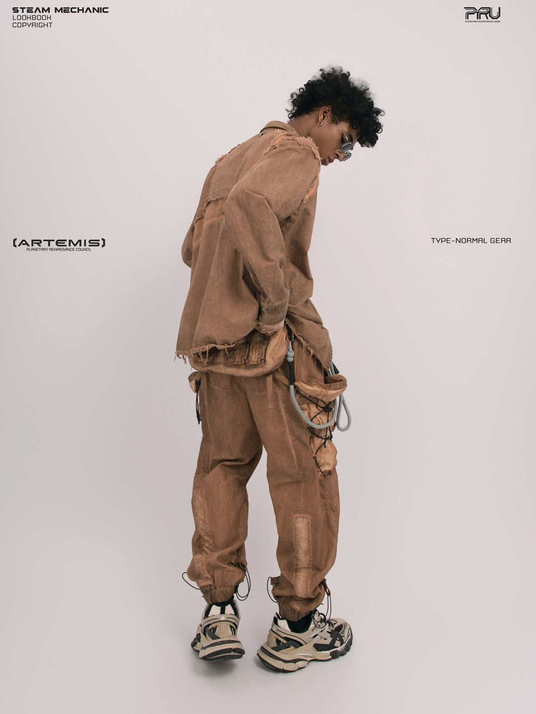 CHAOS ERA raw-edge technical shirt in brown — opposite rear three-quarter view showing raw-edge seams