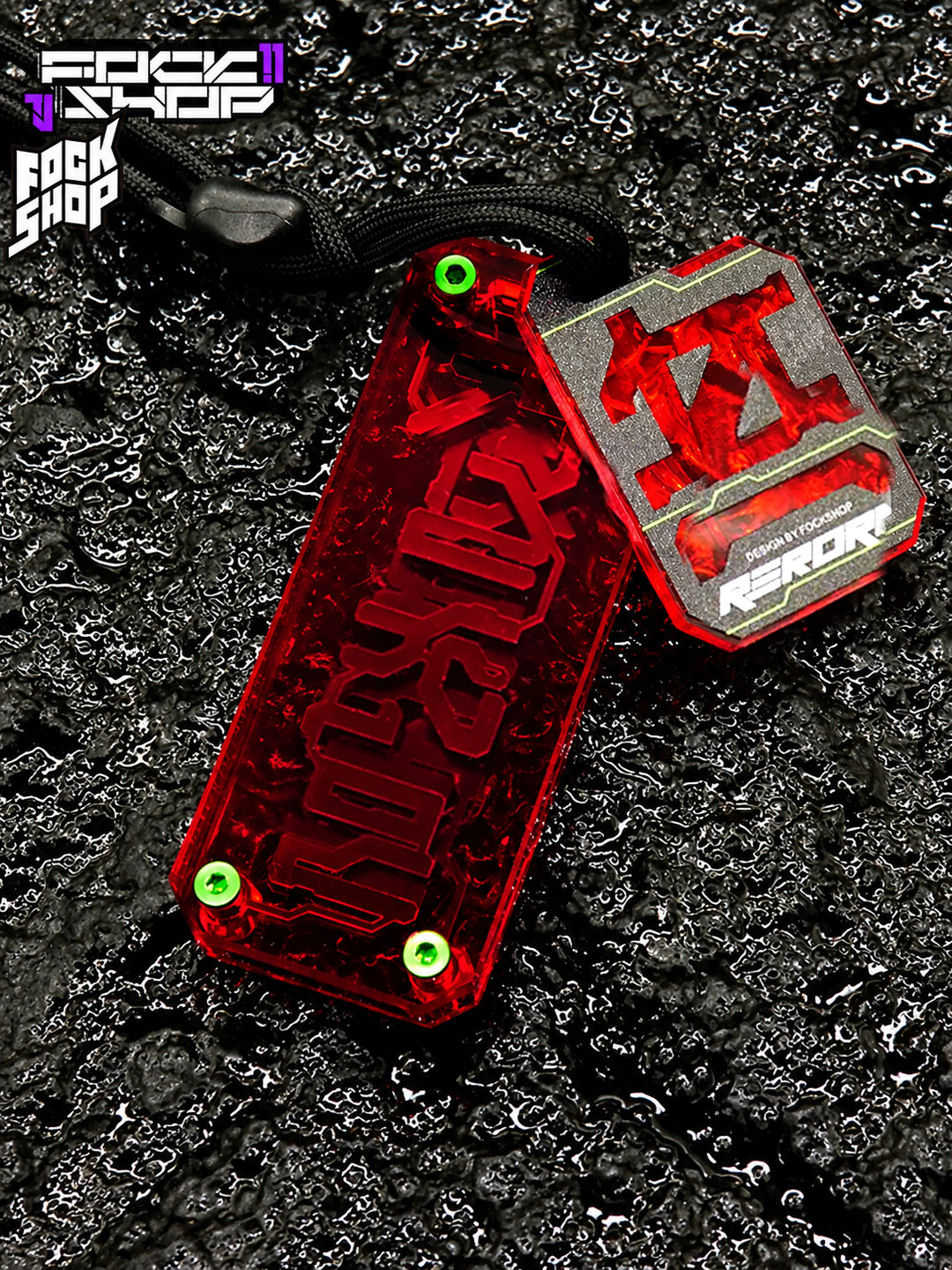 FOCKSHOP REBORN talisman charm — RED RIPPLE close-up showing the textured red backing and small plaque