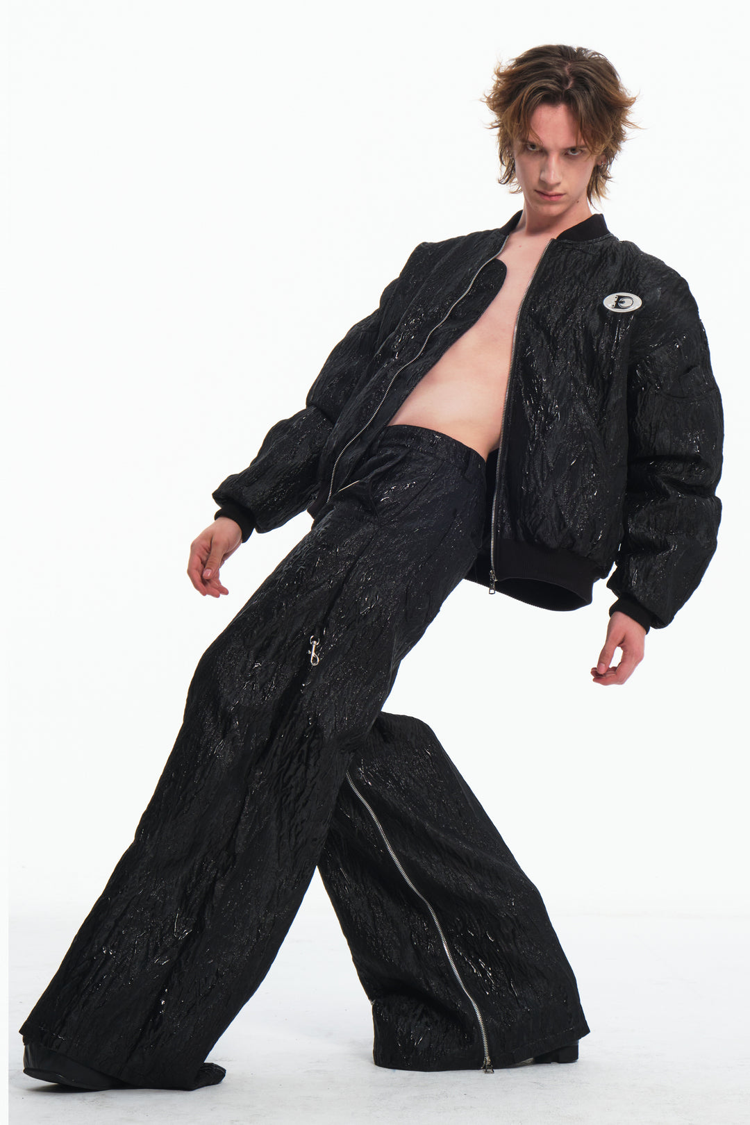 EMBRYO VENOM SHELL convertible zip skirt-pants — rear modeled view