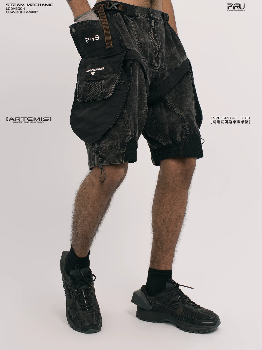 ARTEMIS blackbird black detachable technical shorts — rear modeled view