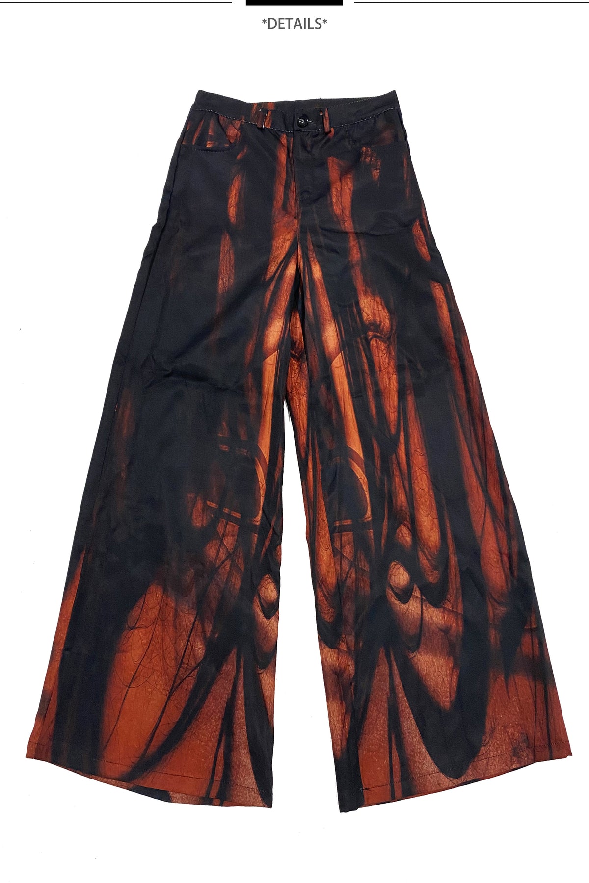 EMBRYO NERVE BLOOM printed flare pants — full-length modeled view