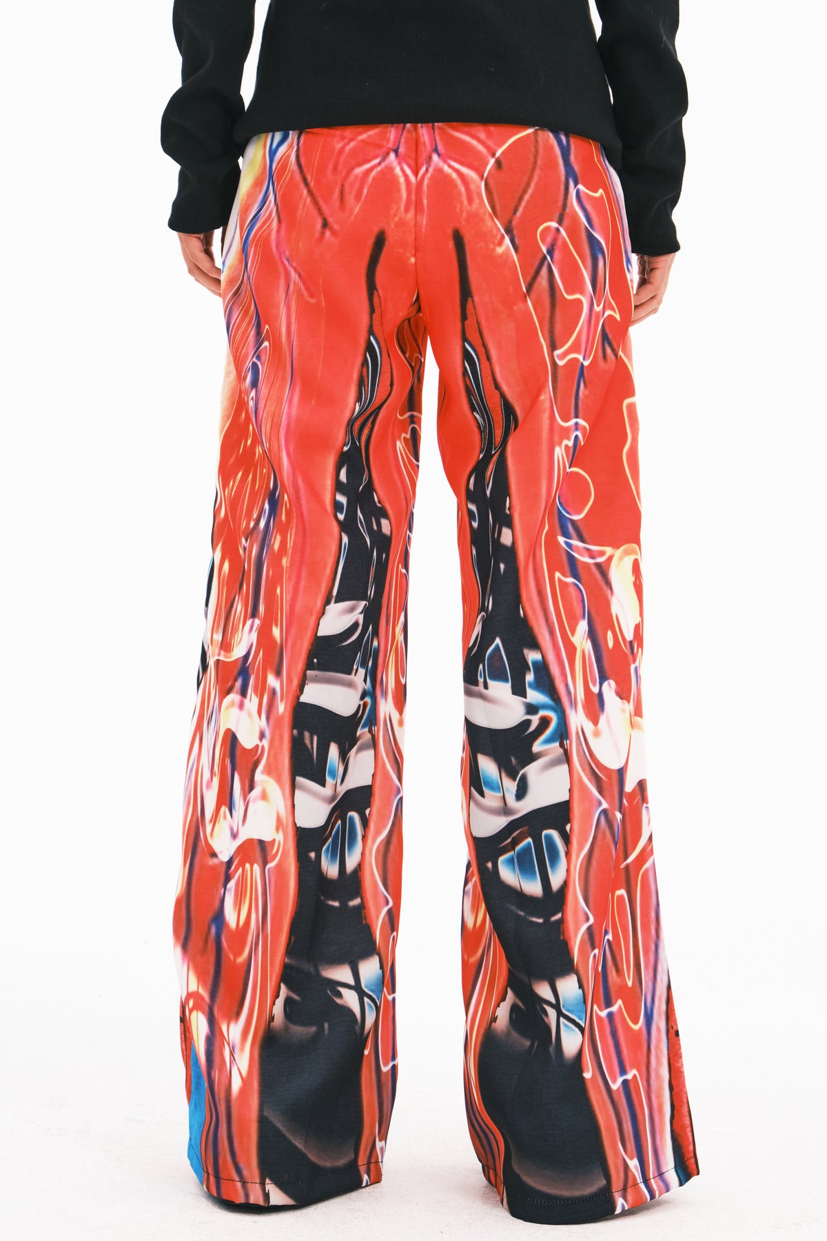EMBRYO NEURAL FIRE printed flare pants — rear modeled view