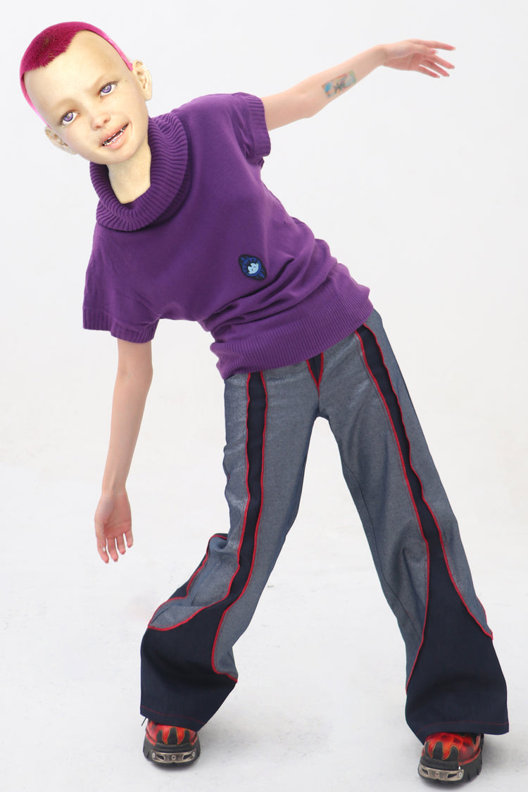 EMBRYO STARSHIFT patchwork flare jeans — close modeled view