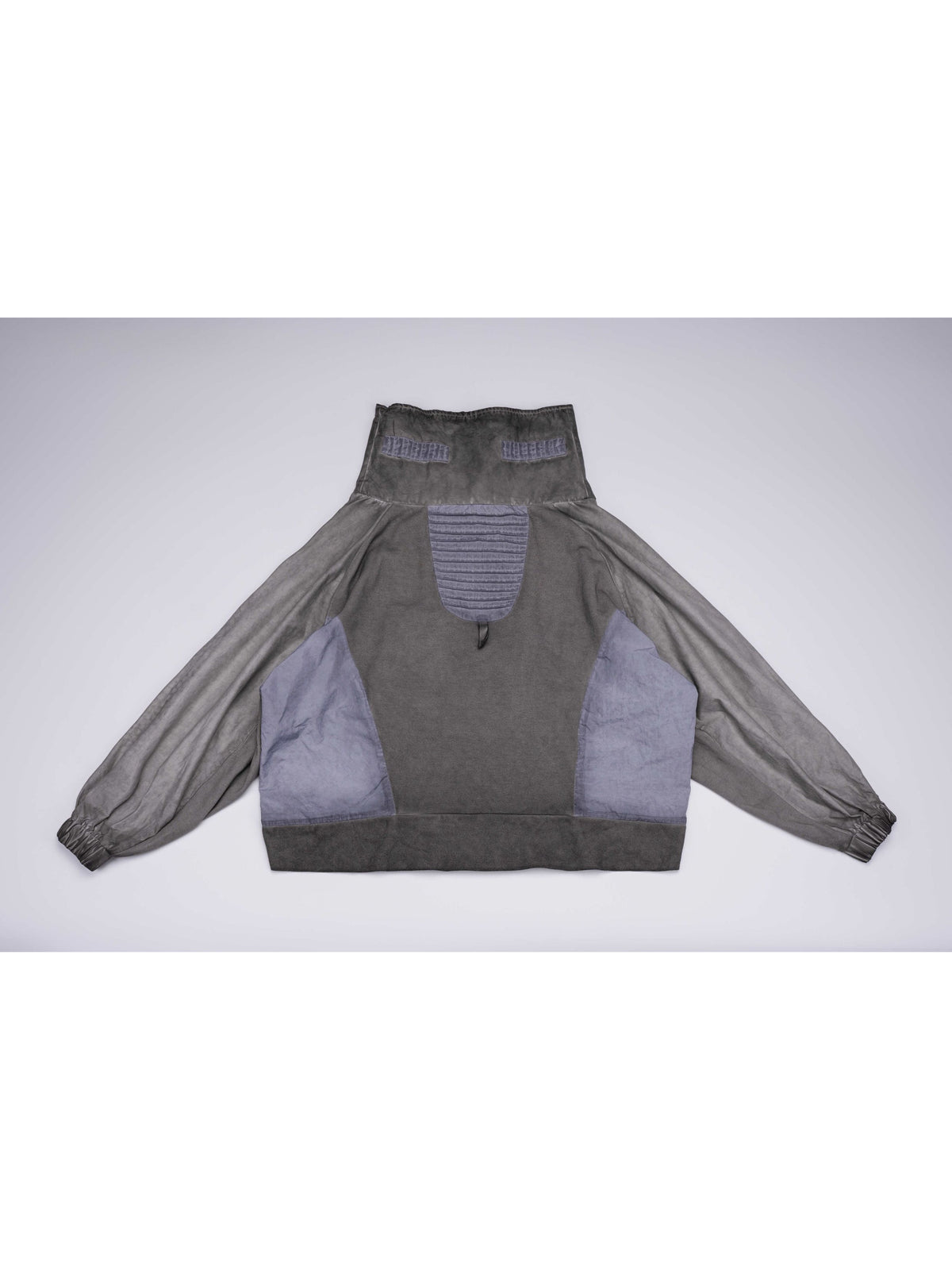 PIONEER moon dust gray detachable-pocket utility hoodie — back flat-lay view showing the pleated contrast panel and long back hem