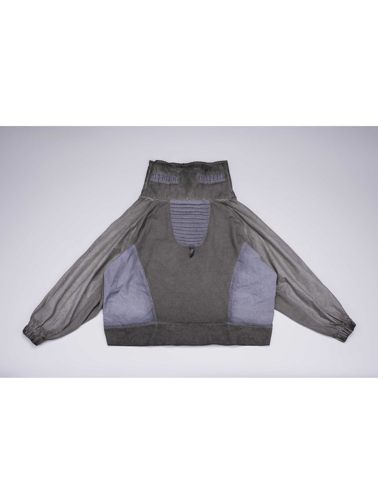 PIONEER moon dust gray detachable-pocket utility hoodie — back flat-lay view showing the pleated contrast panel and long back hem