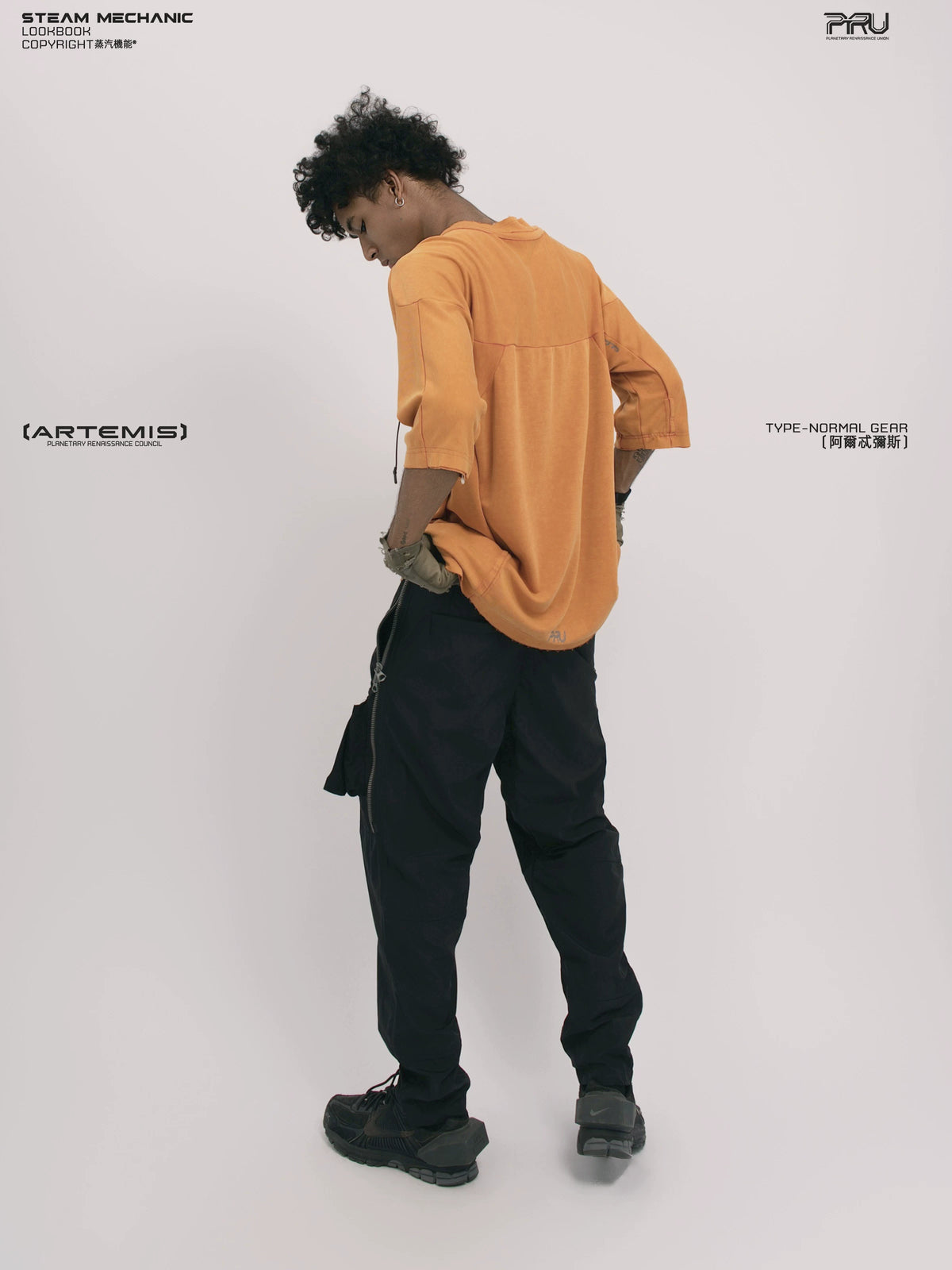 LIGHTSHADOW eclipse orange deconstructed technical tee — full-length styled view