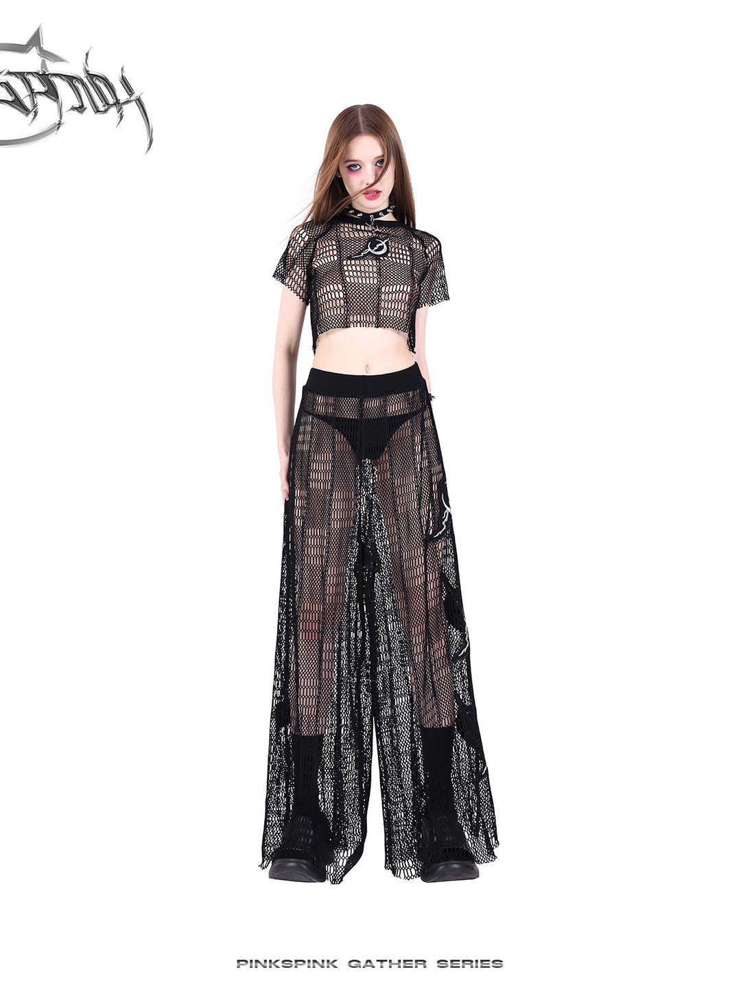 PINKSPINK GEOMETRY open-mesh crop tee in black — front modeled view with a hand raised beside the face