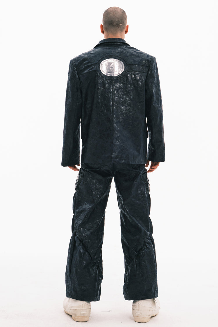 EMBRYO HORN CODE textured PU leather blazer — material and hardware detail