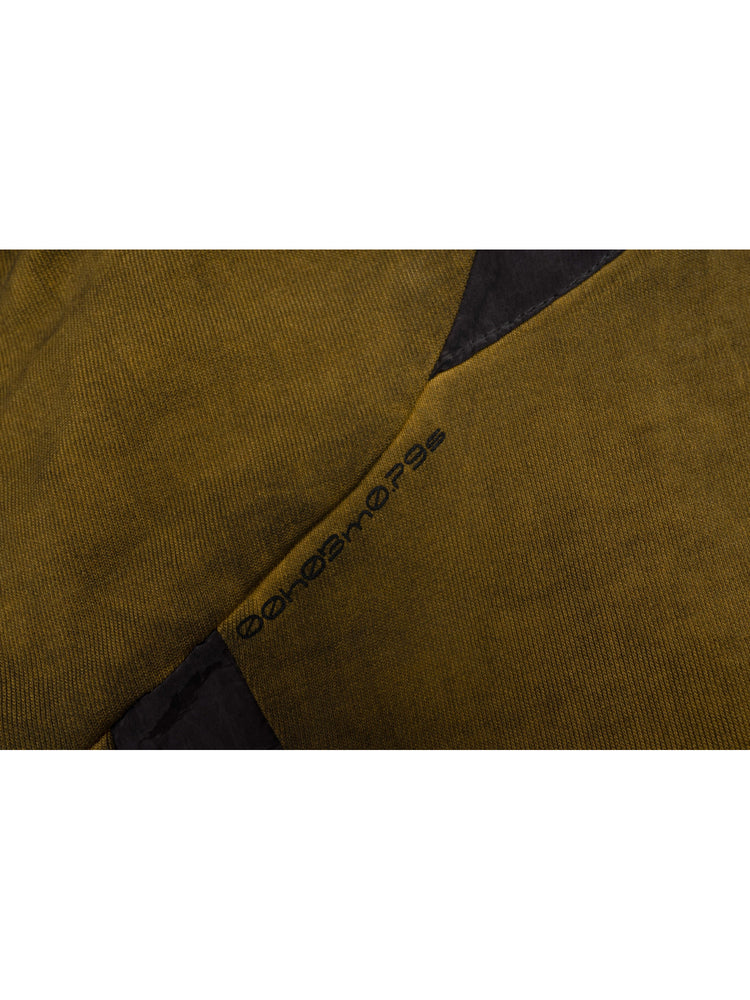 PIONEER mars yellow drawstring commuter sweatshirt — close-up of the sleeve panel seam and small printed garment marking