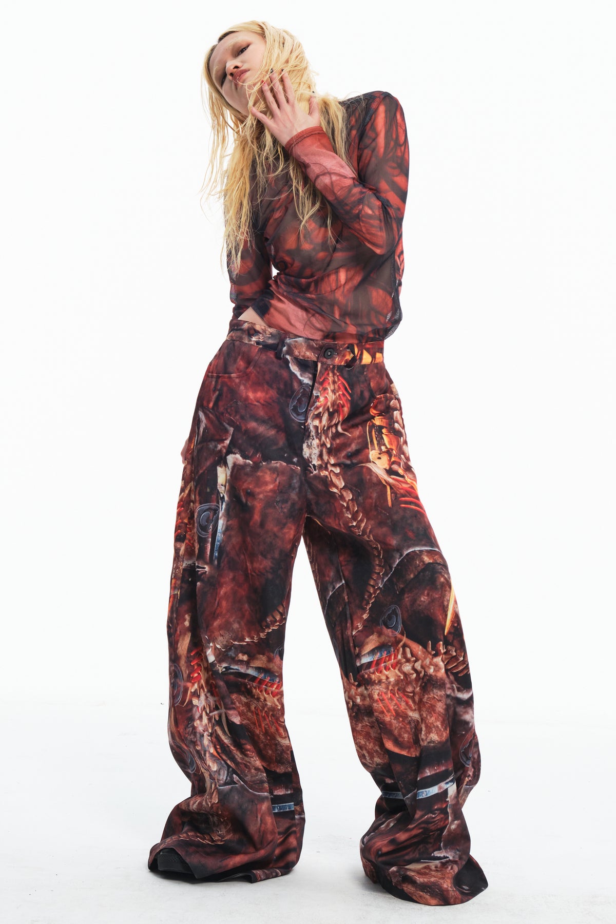 EMBRYO BONE RELIC printed wide-leg pants — close modeled view