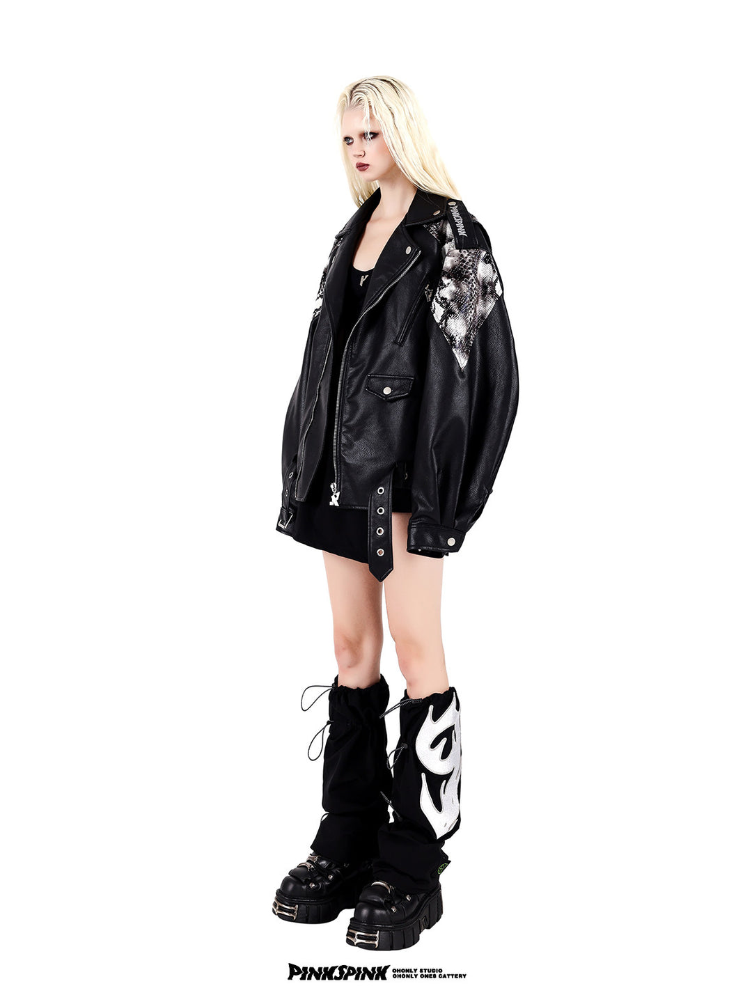 PINKSPINK COBRA snake-print faux-leather moto jacket — black side view styled with leg warmers