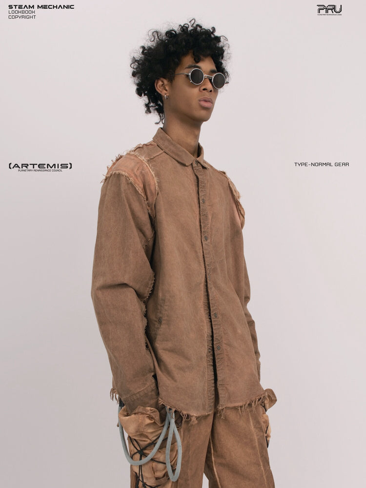CHAOS ERA raw-edge technical shirt in soft dawn orange — side modeled close-up showing the collar and raw-edge shoulder