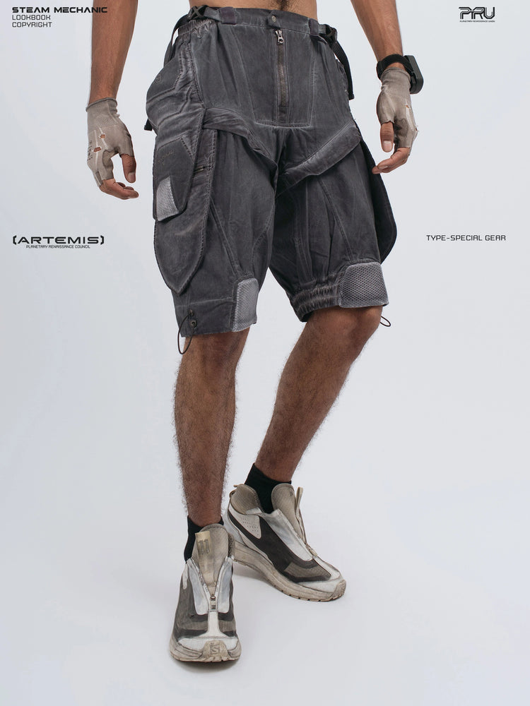 ARTEMIS stellar blue detachable technical shorts — angled front view with open left hand