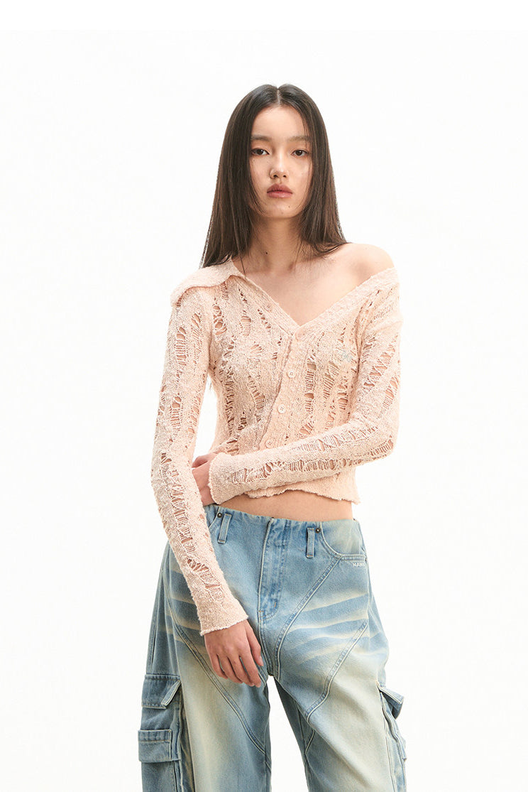 NAWS NOMAD asymmetric cutout knit cardigan — alternate angle showing the shape and finish