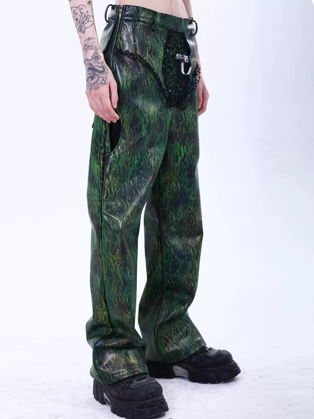 EMBRYO TRIANGLE ARMOR lace-inset leather pants — front modeled view