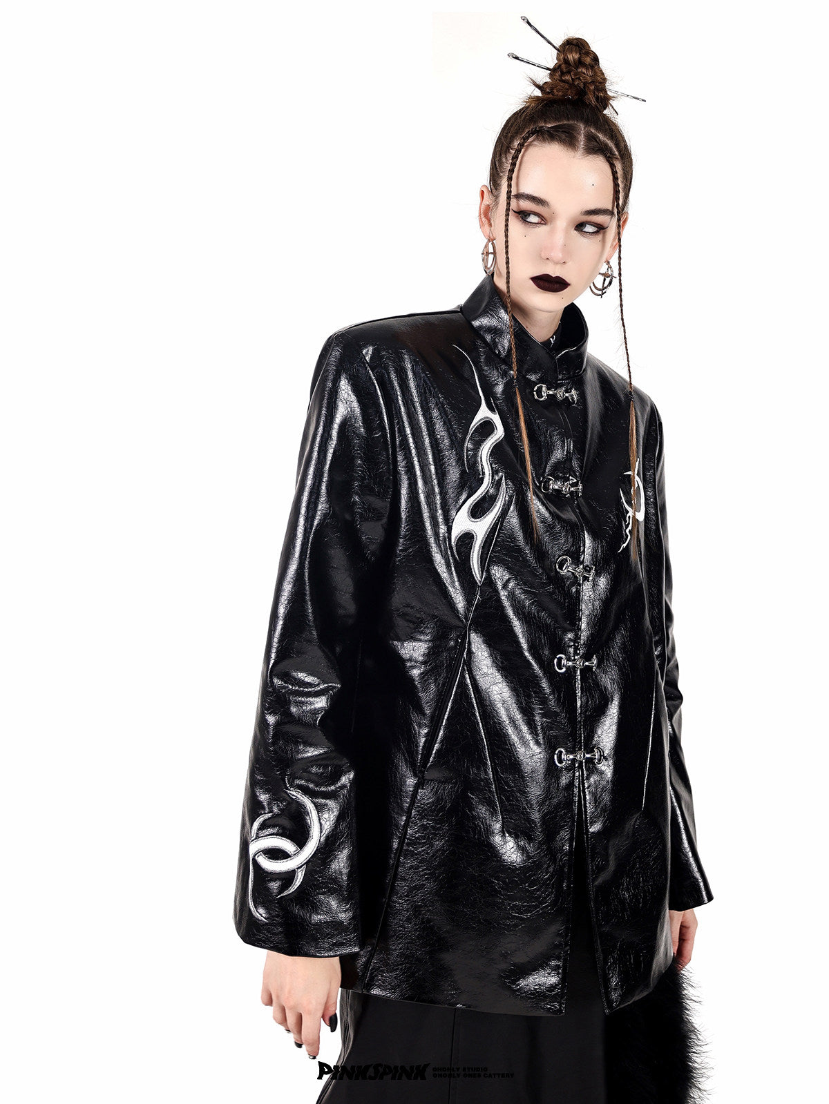 PINKSPINK ELECTRIC MOON embroidered buckle jacket — black three-quarter close-up showing the shoulder shape and sleeve embroidery
