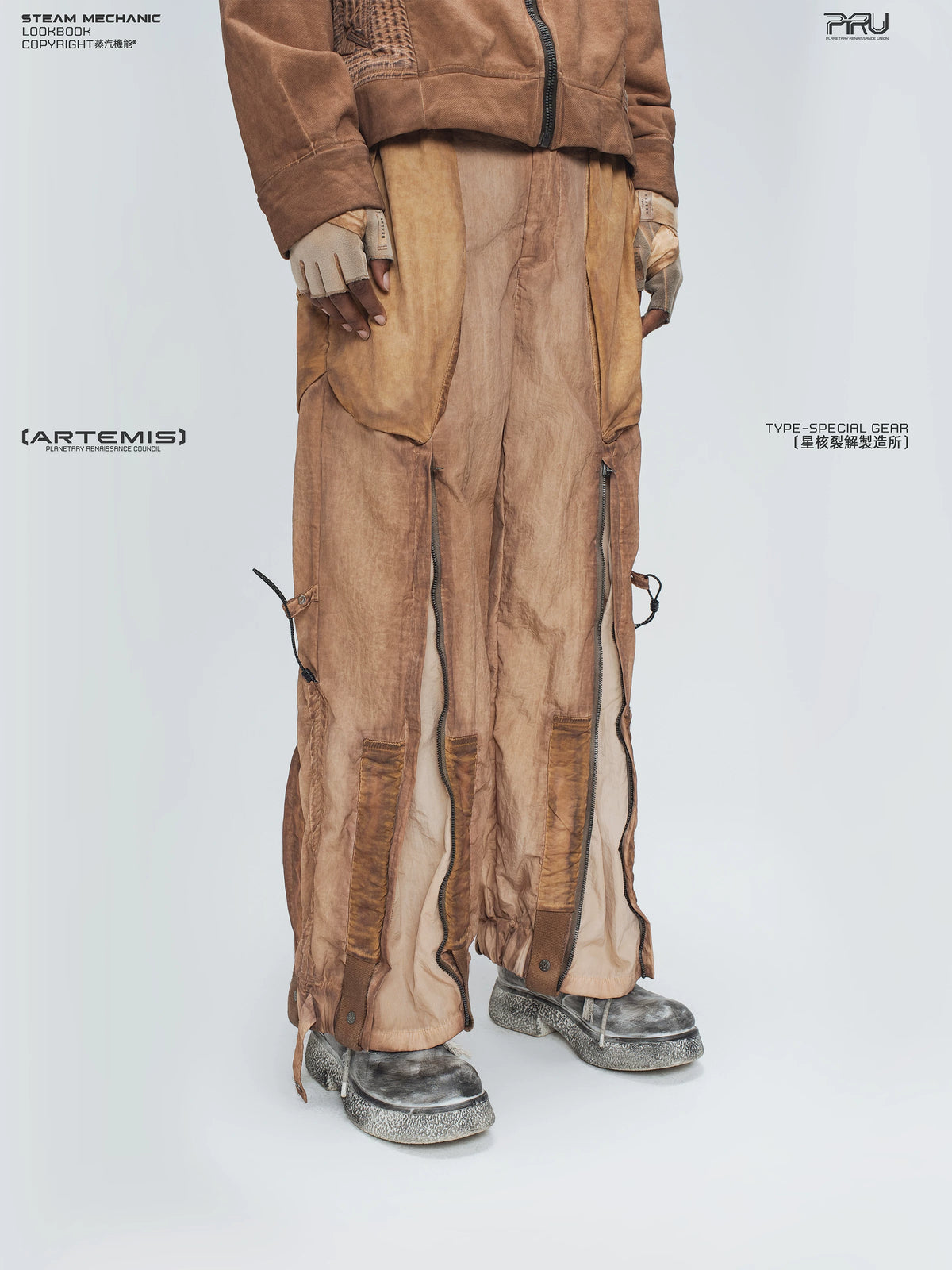 STARCORE venus orange engineer utility pants — full-length styled view