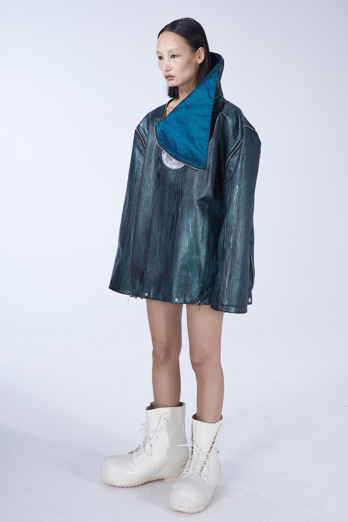EMBRYO EXOSHELL convertible multi-zip hoodie vest — full-length modeled styling view