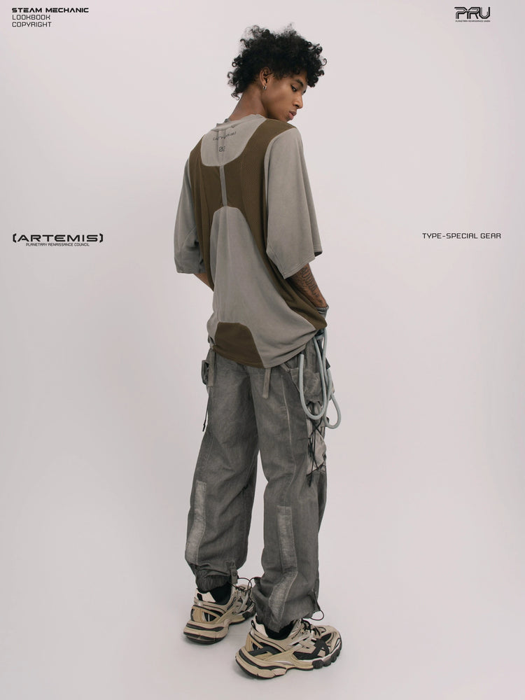 STARFIELD WELDER steel tundra distressed mesh tee — rear three-quarter view looking over the shoulder