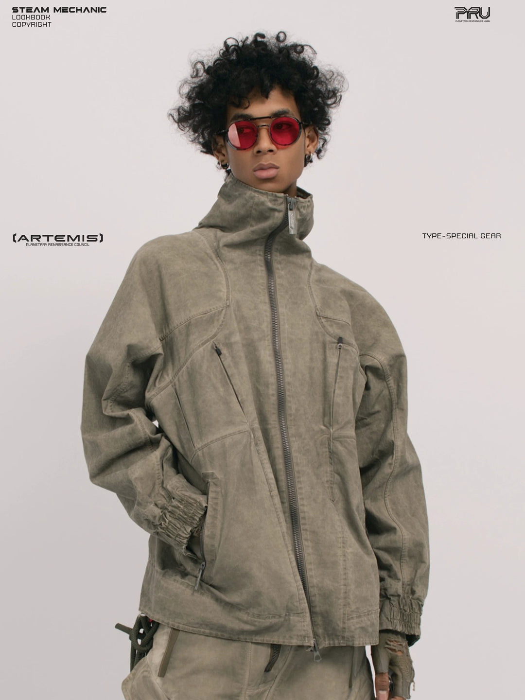 ARTEMIS tuck-paneled technical jacket — front three-quarter modeled view with raised collar