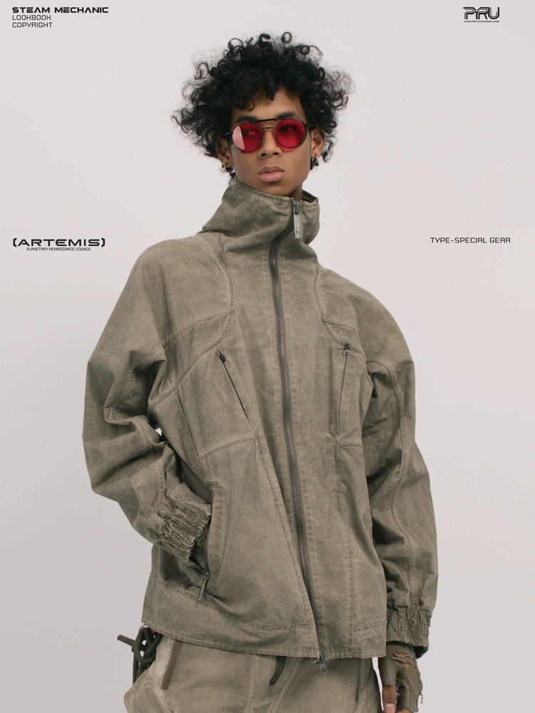 ARTEMIS tuck-paneled technical jacket — front three-quarter modeled view with raised collar
