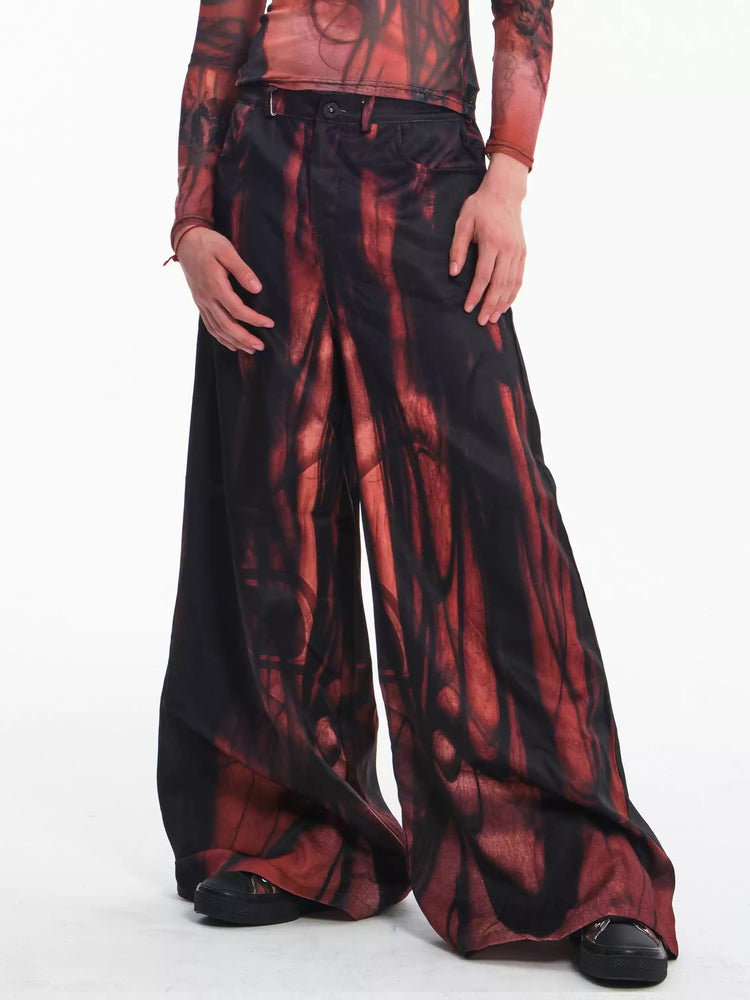 EMBRYO NERVE BLOOM printed flare pants — rear or construction presentation