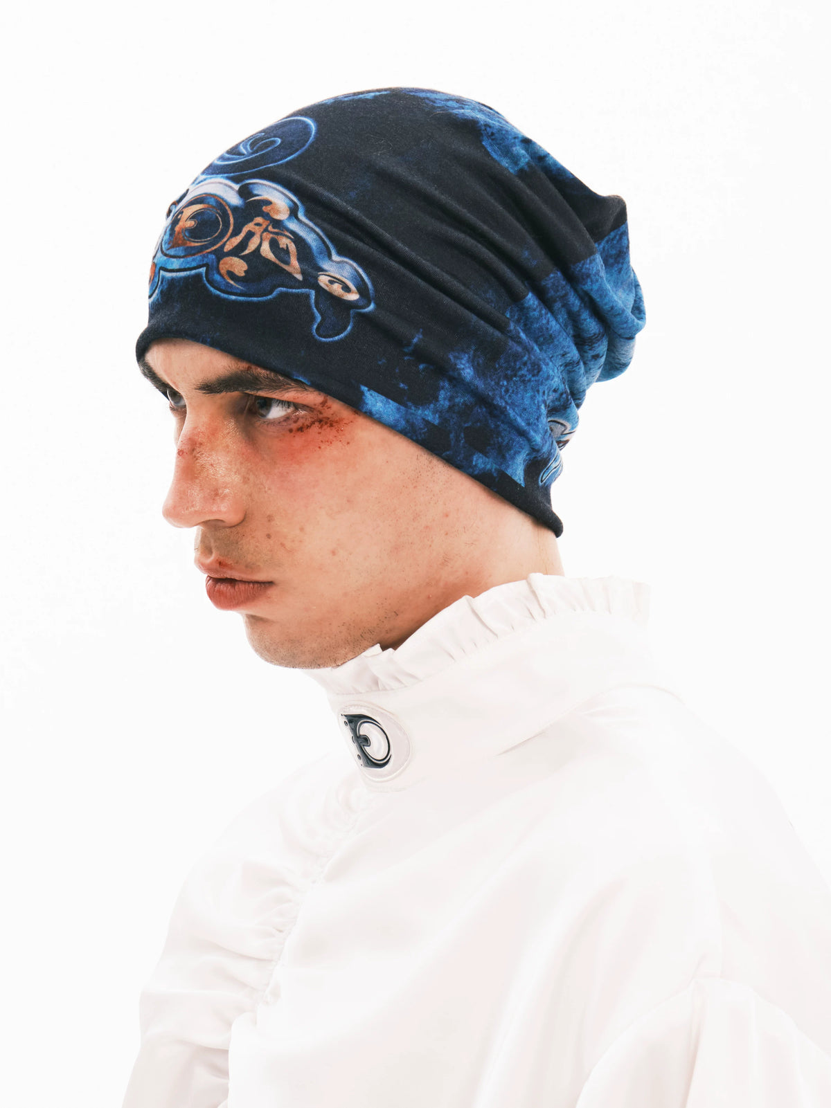 EMBRYO ANCIENT CODE graphic slouch beanie — alternate styled presentation