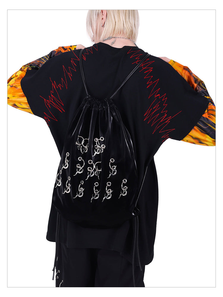 PINKSPINK FIRE CAT layered-sleeve graphic tee — alternate modeled styling view